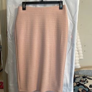 Pencil skirt. S(labeled) goes on M-L (Good feet)